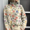 Lucy - Floral knit turtleneck jumper
